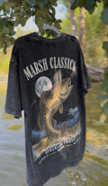 Oversized unisex drop should fishing t shirt featuring the Rigolets Supply Logo, and a large speckled trout under a full moon with the text 'MARSH CLASSICS' at the top and 'speckled trout mc002" at the bottom.